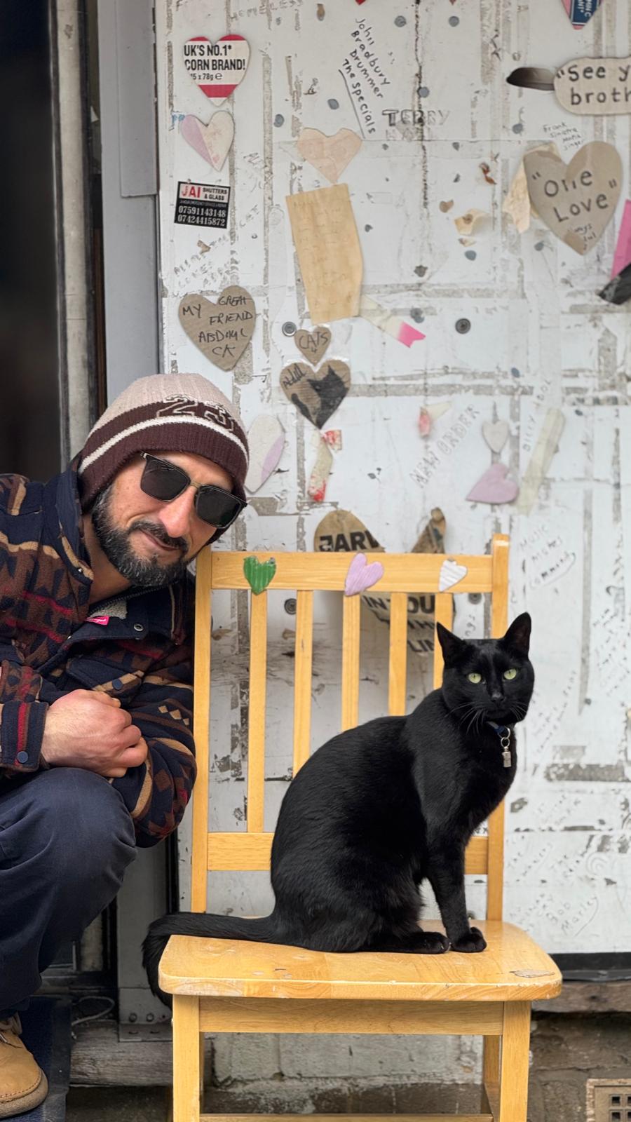 Abdul and Mimi outside the shop